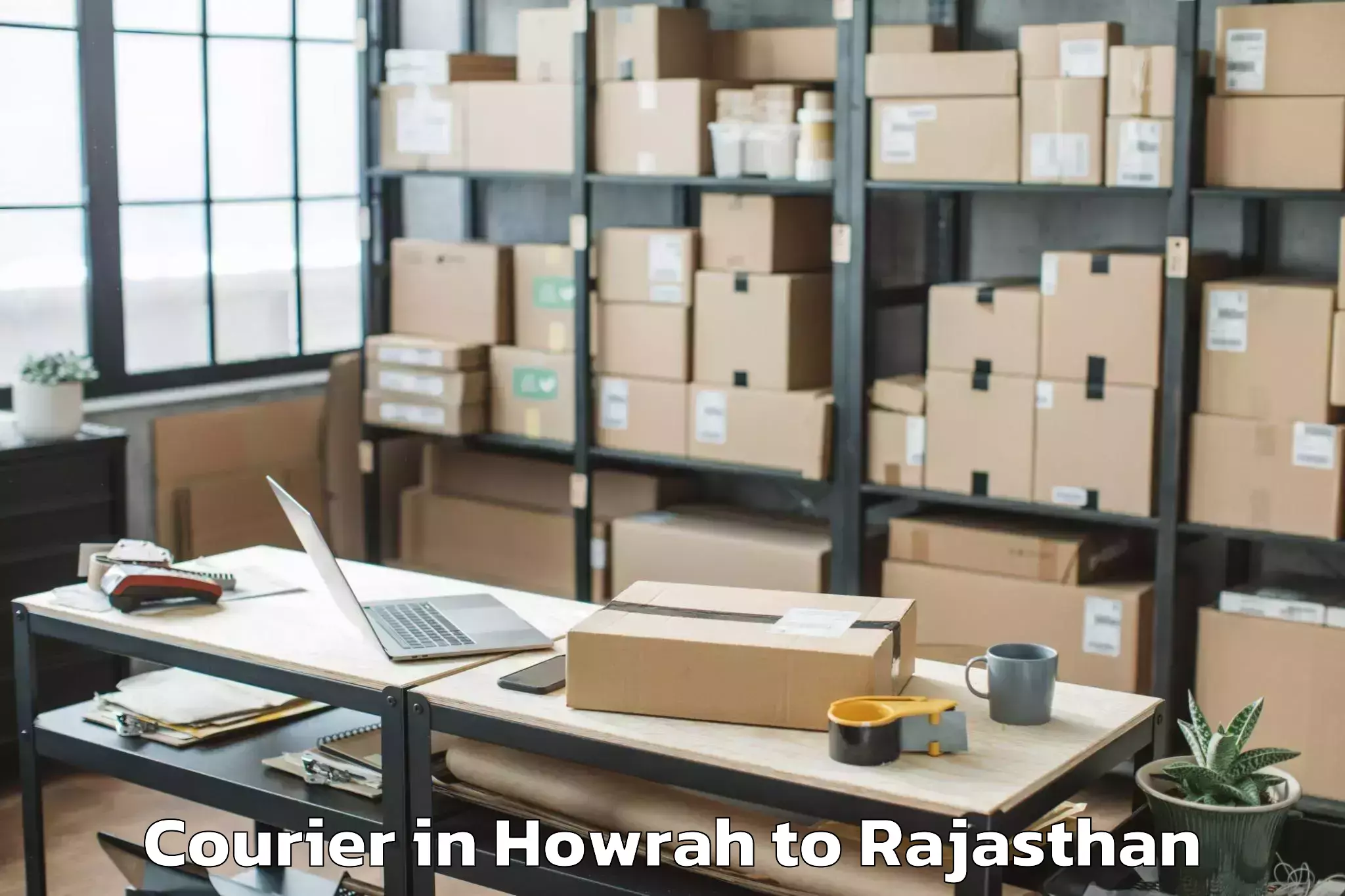 Leading Howrah to Bhadasar Courier Provider